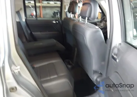 2015 Jeep Patriot High Altitude Edition from USA, damaged, VIN 1C4NJRFB4FD382647